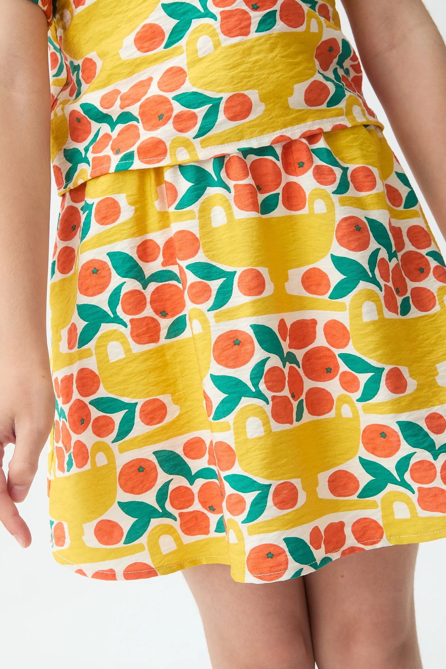 Girls' short skirt with Citrus print
