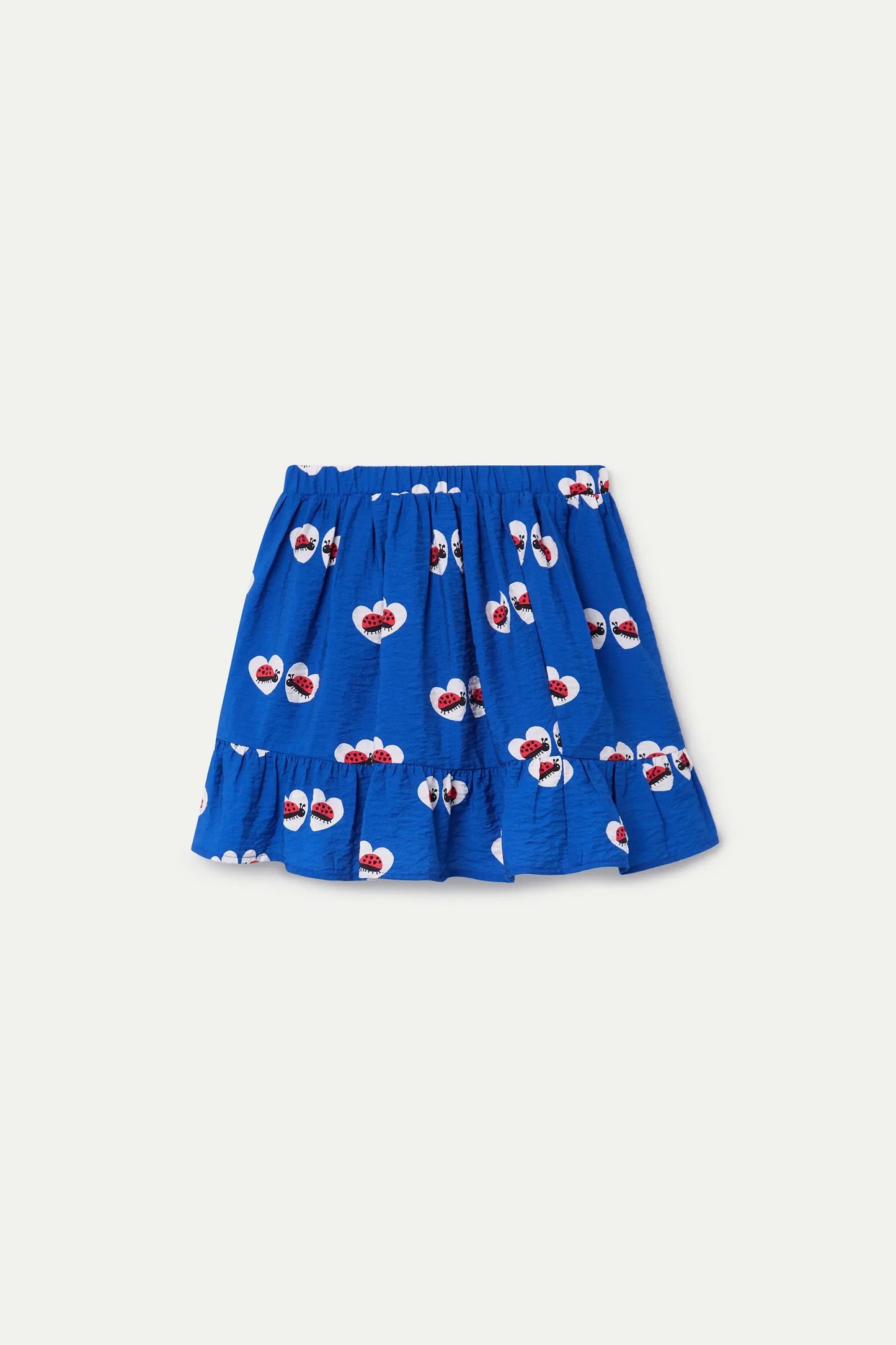 Girl's short skirt with ladybug print