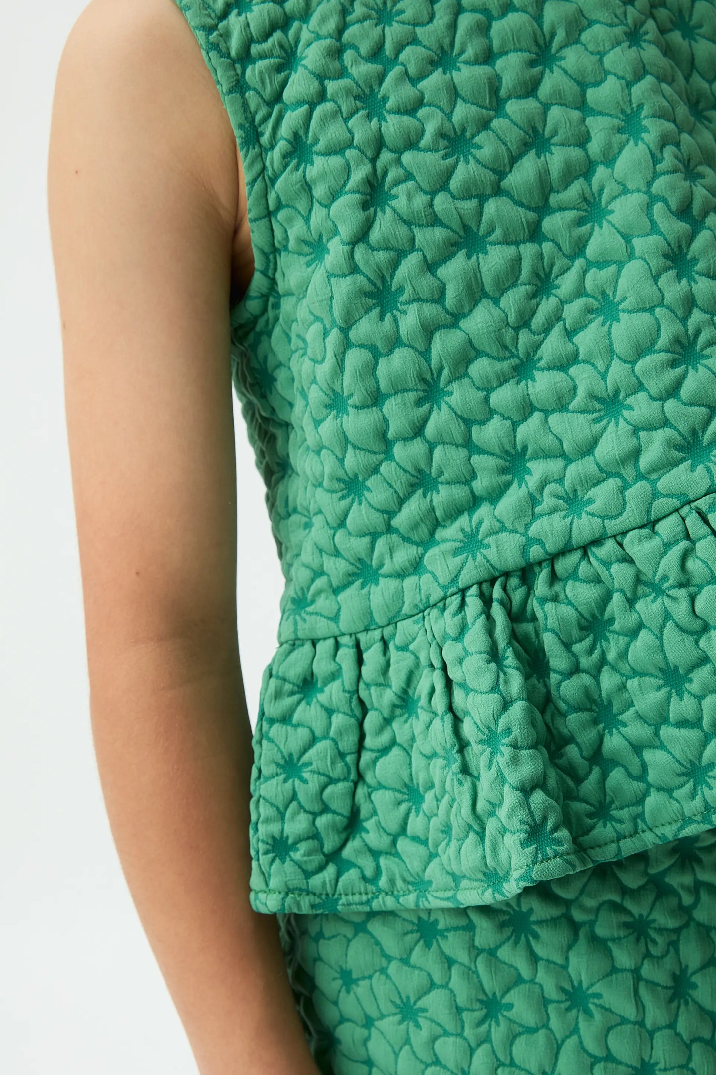 Girl's top with green floral print