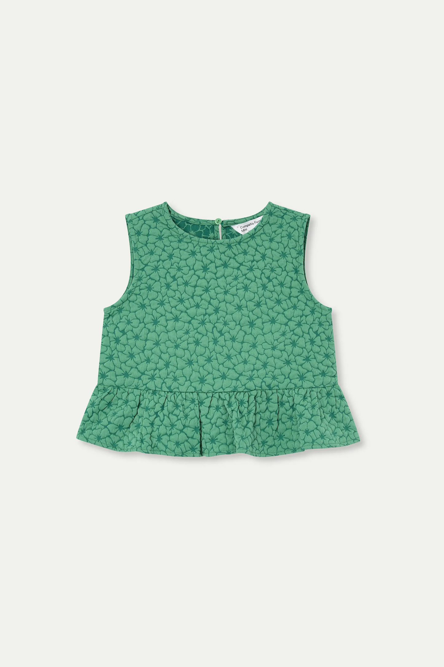 Girl's top with green floral print