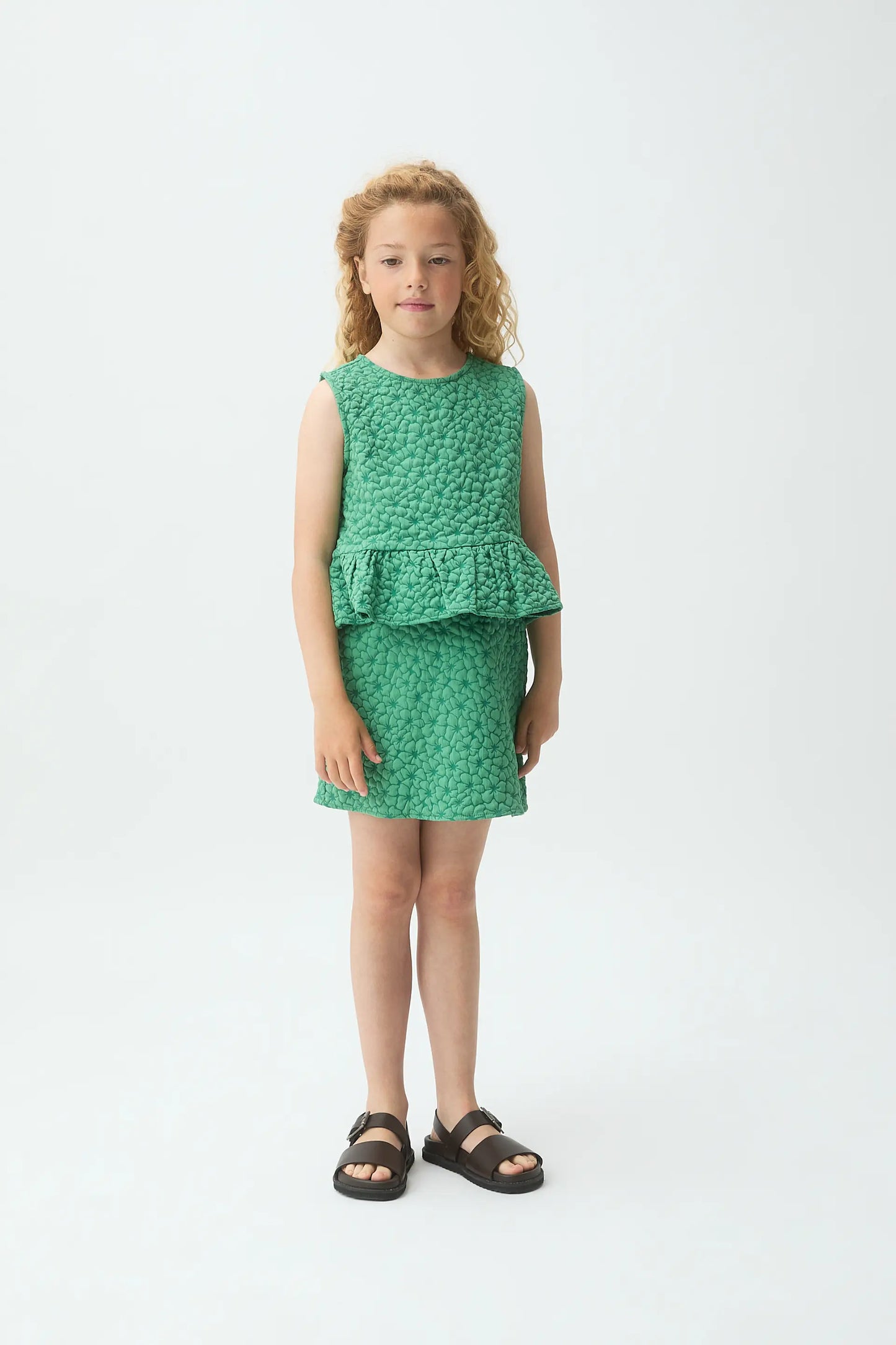 Girl's short skirt with green floral print