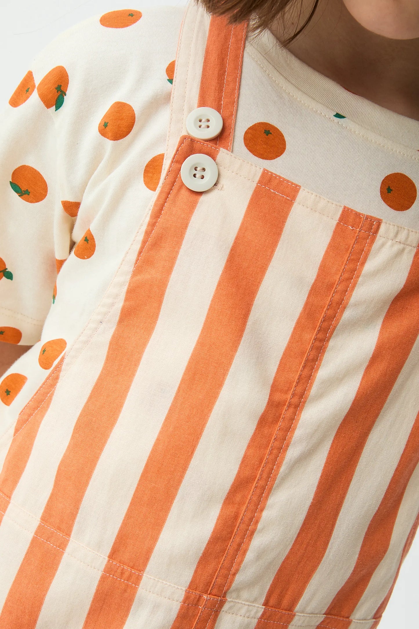 Pichi de niña con estampado Bamboo naranja