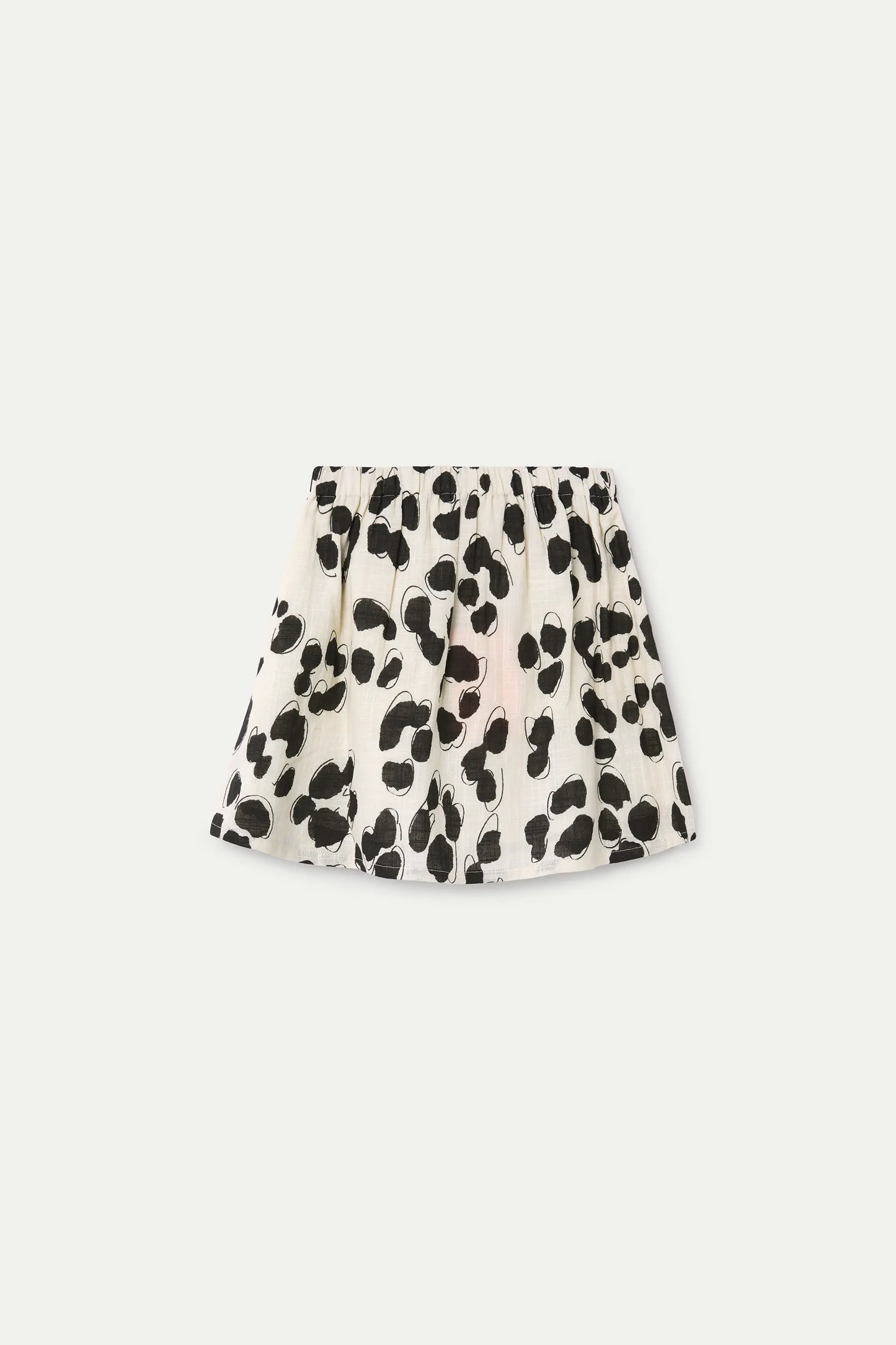 Girls' short skirt with Dalmatian print