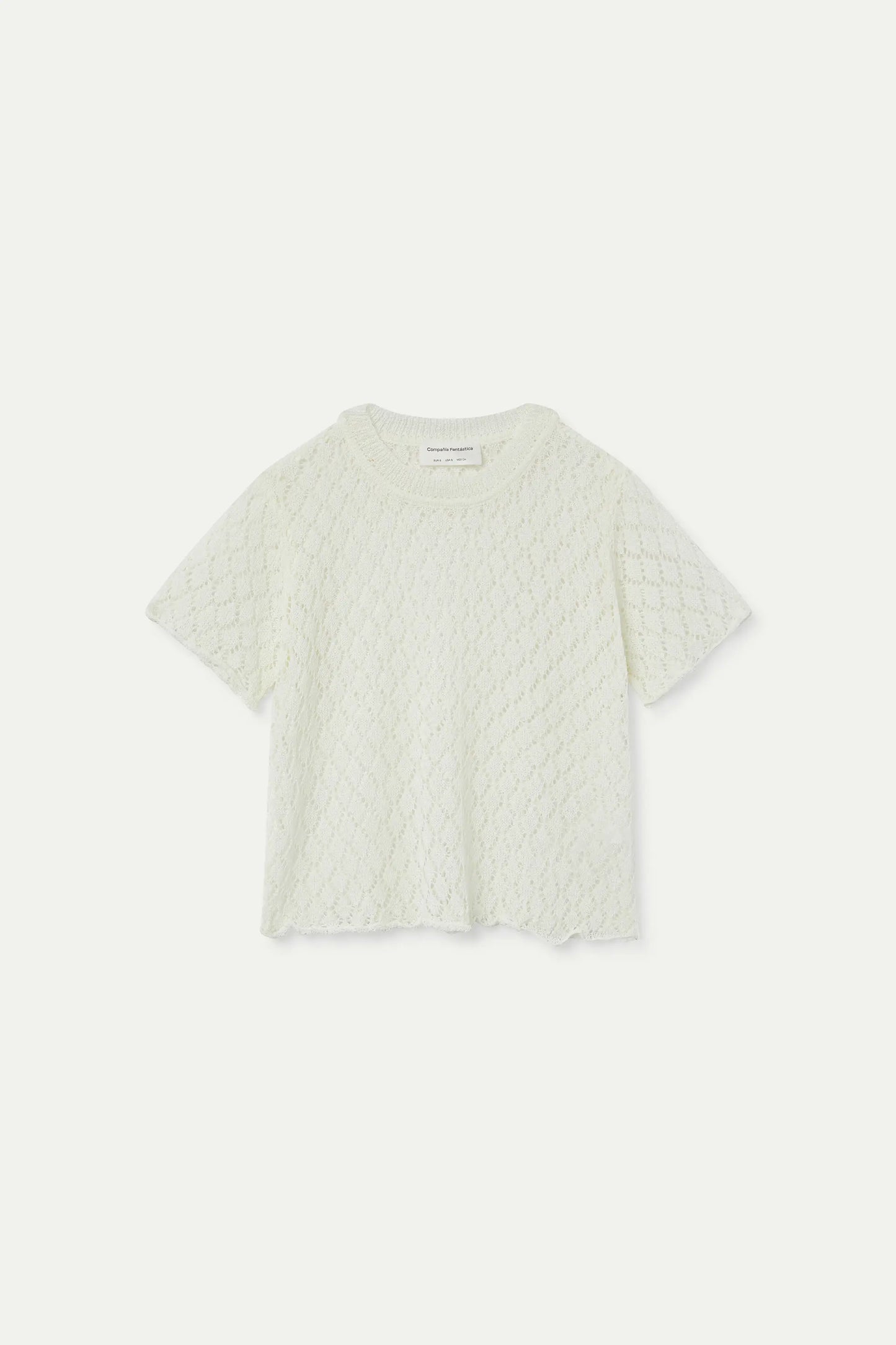 Top in maglia traforata bianca con motivo a rombi