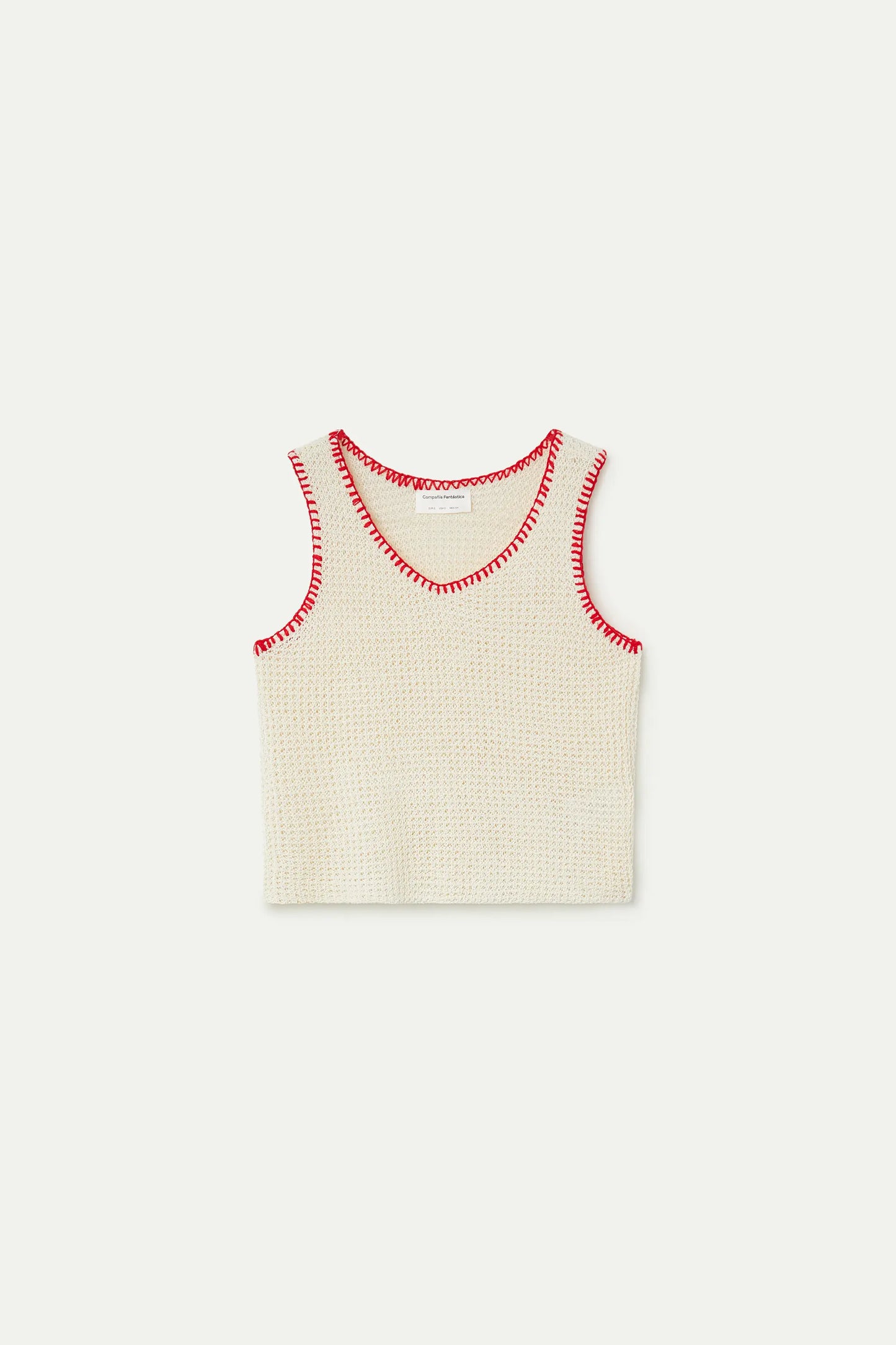 Top in maglia traforata color bianco sporco con dettagli ricamati in rosso