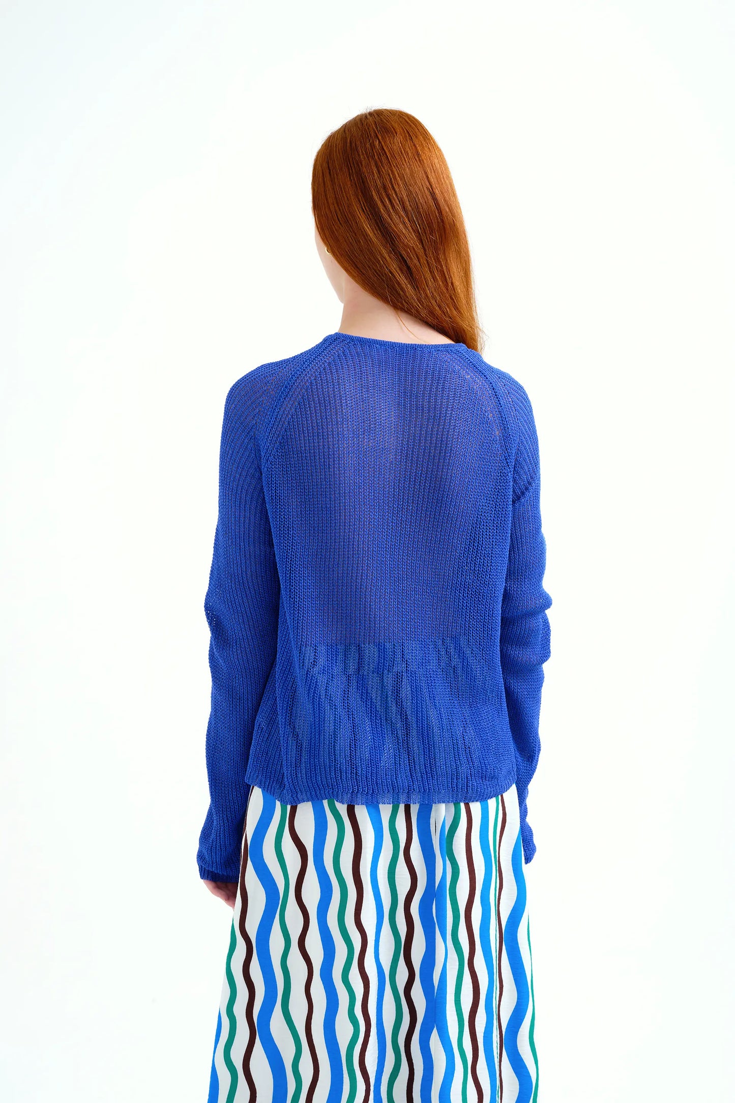 Blue openwork knit sweater
