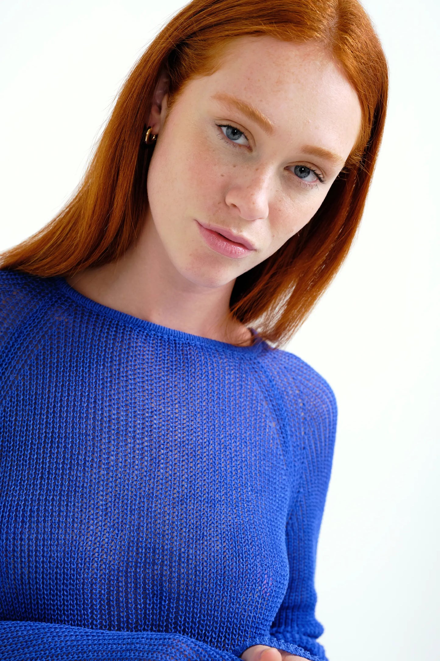 Blue openwork knit sweater