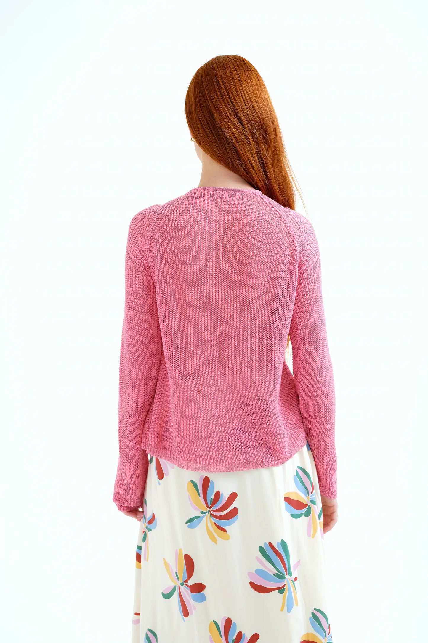maglione rosa lavorato a maglia traforata