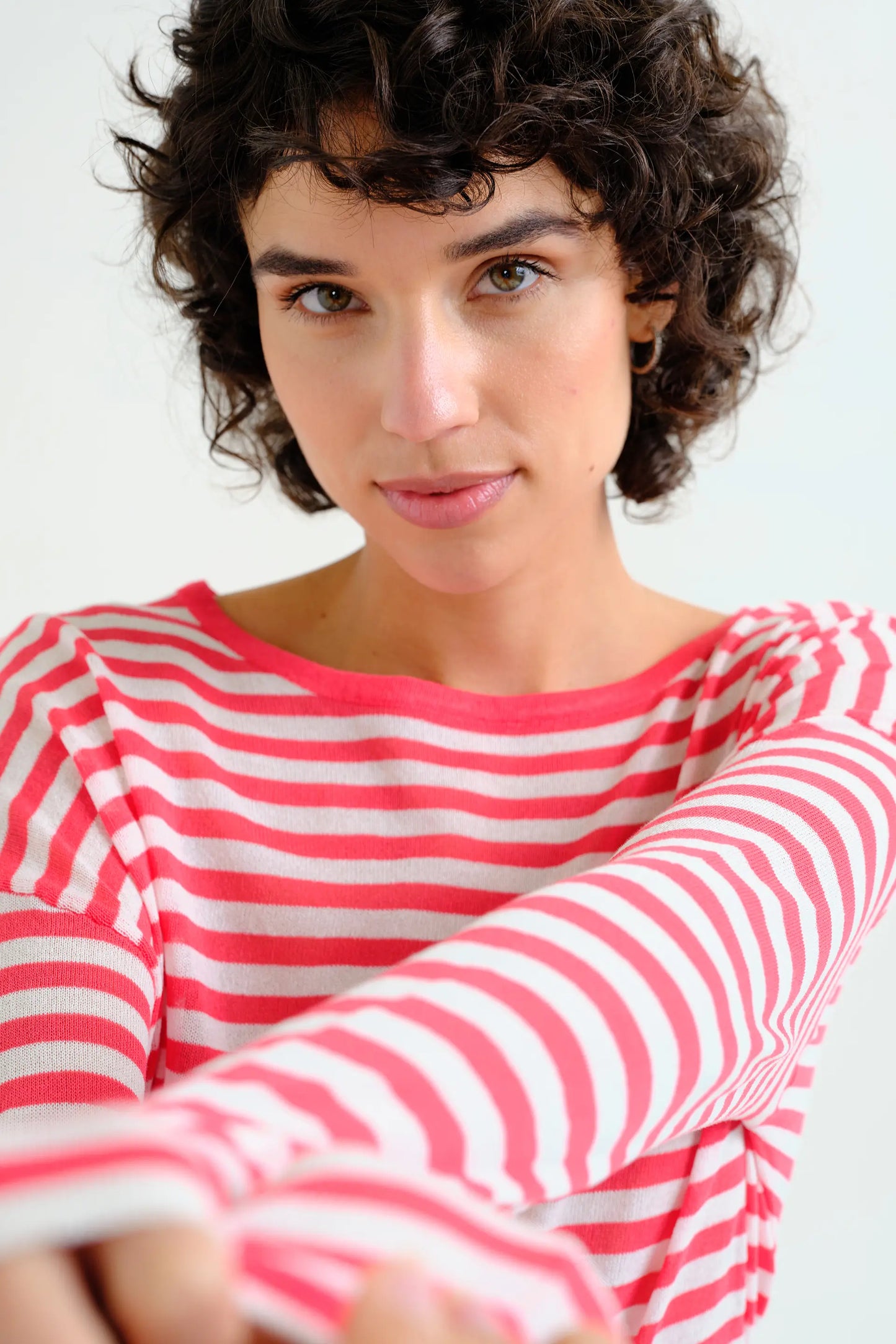 Soft knit sweater with white and red striped print