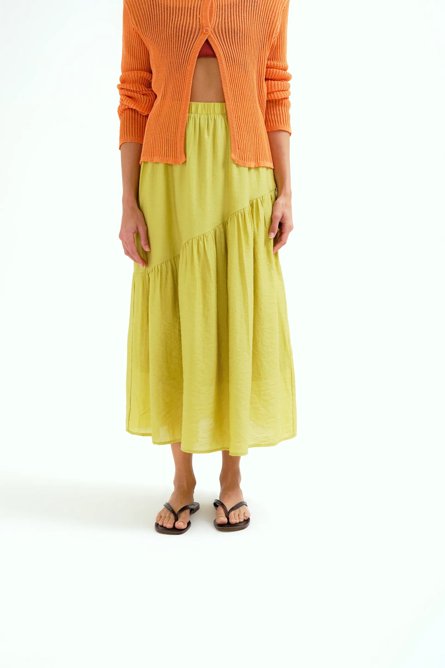 pistachio green maxi skirt with asymmetrical cut