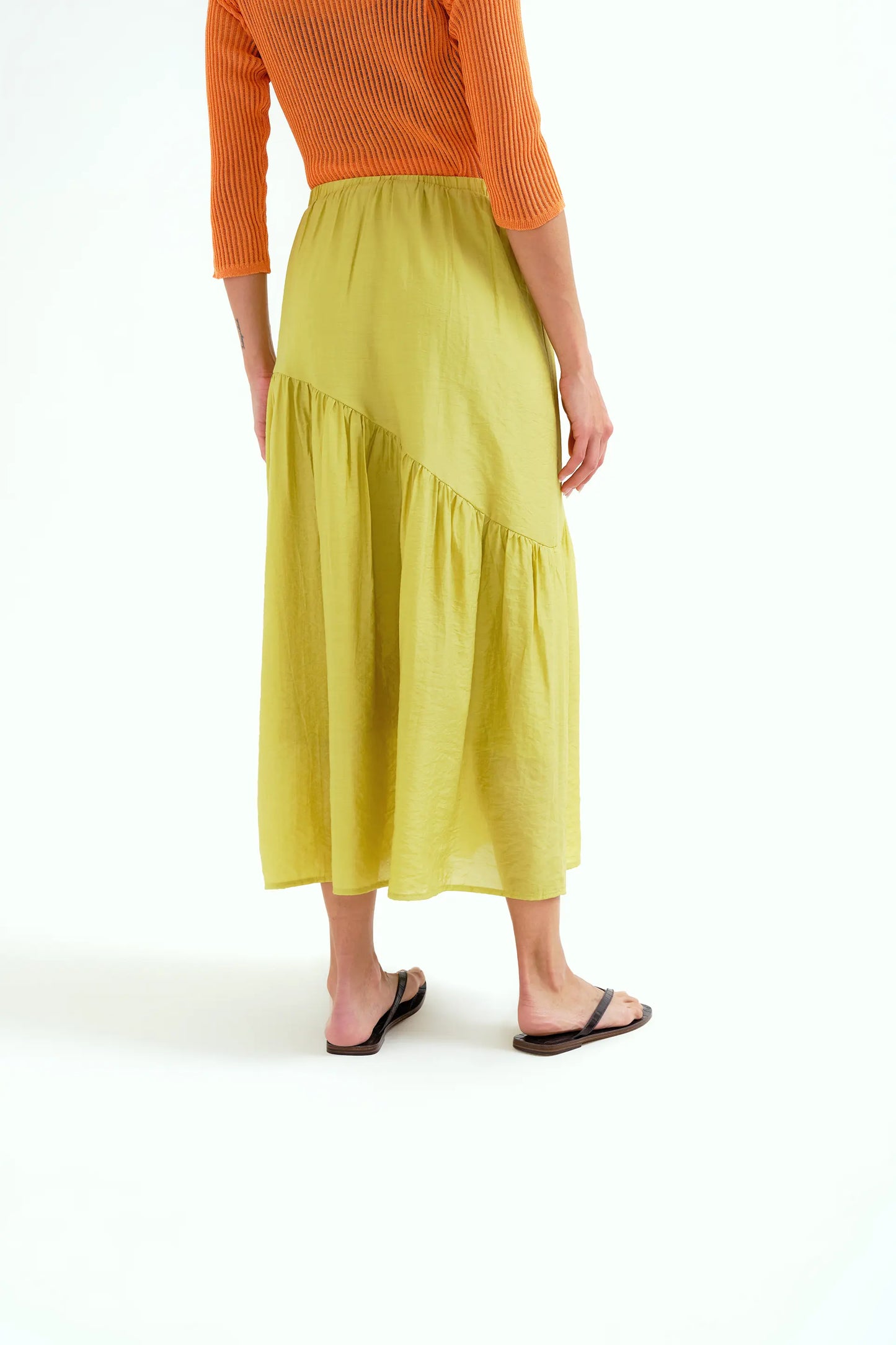 pistachio green maxi skirt with asymmetrical cut