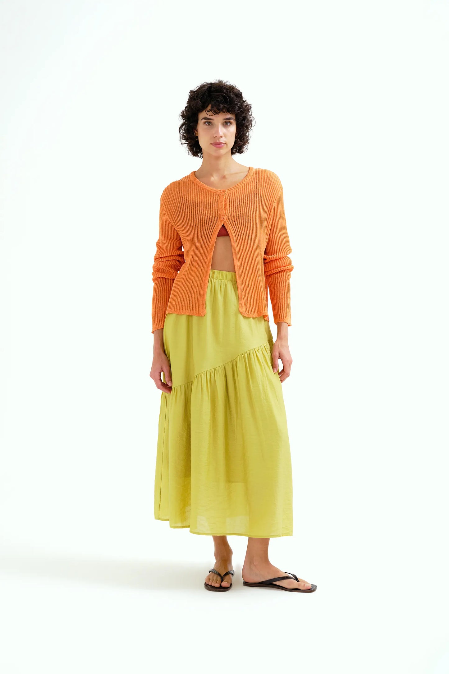 pistachio green maxi skirt with asymmetrical cut