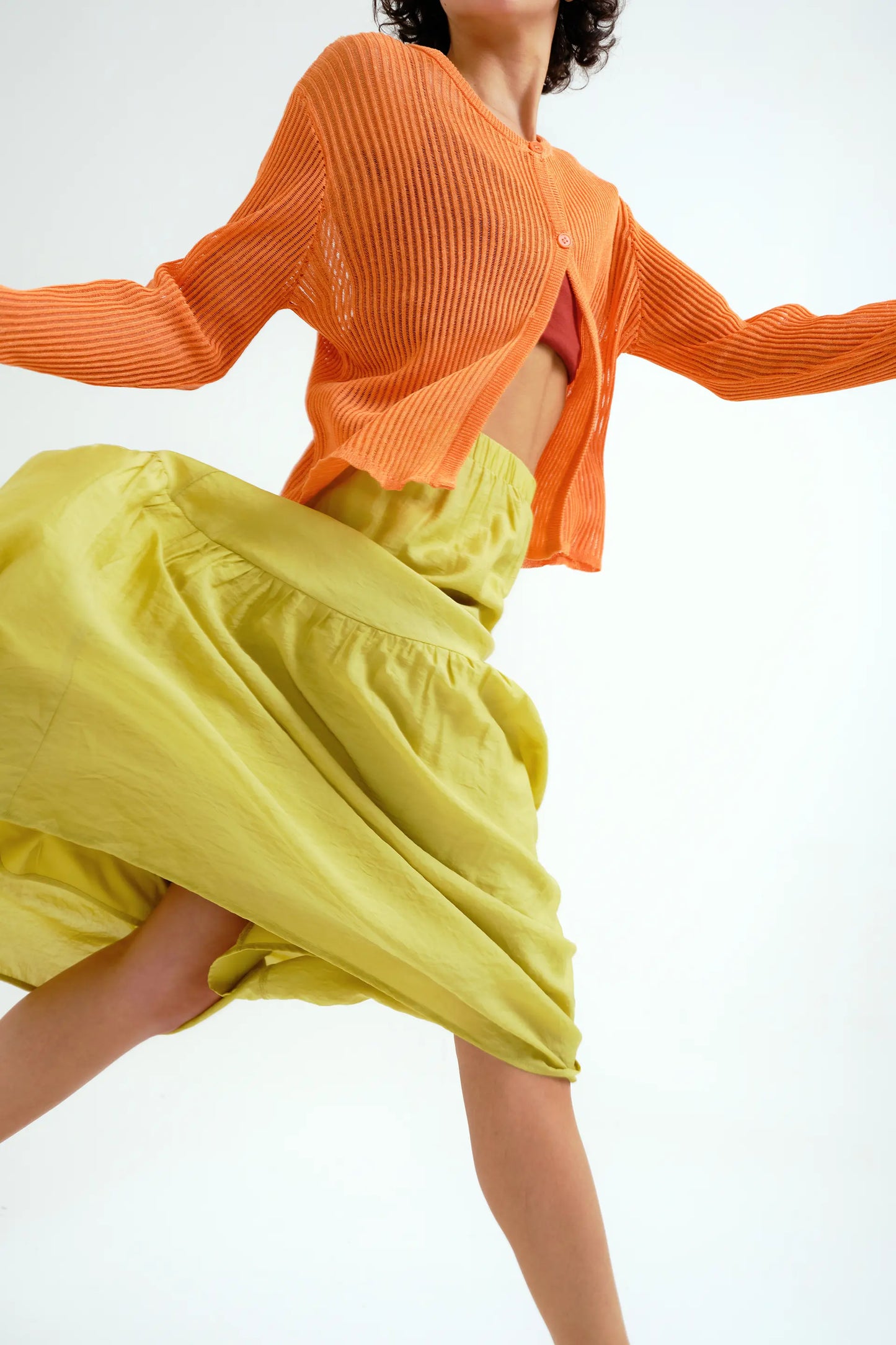 pistachio green maxi skirt with asymmetrical cut