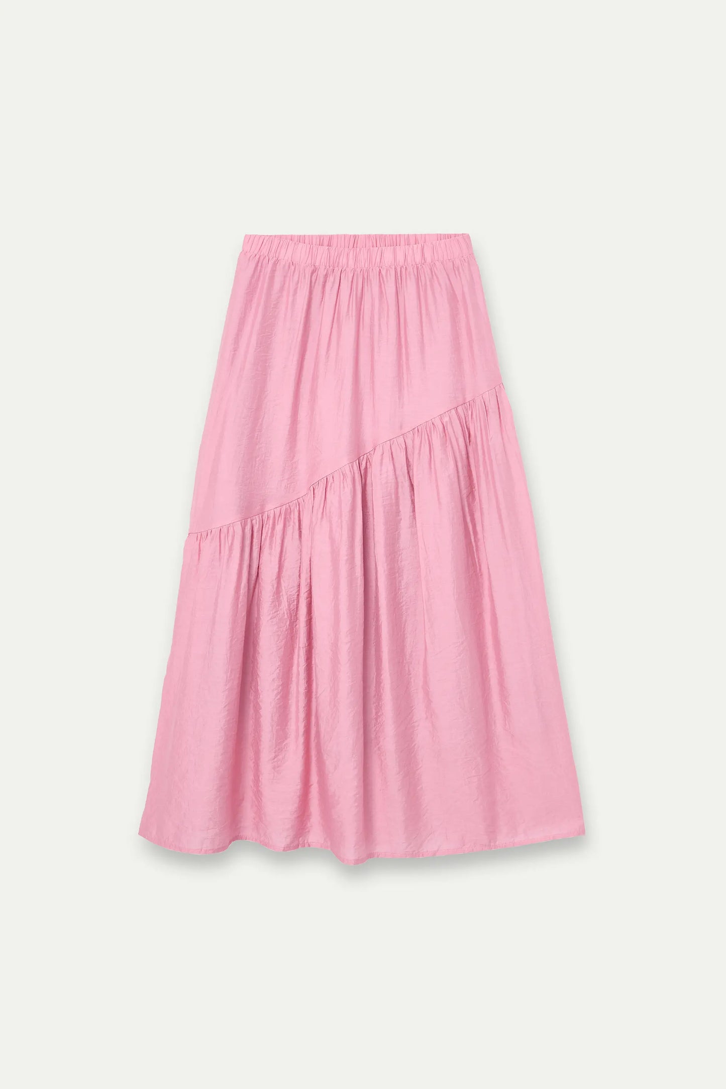 Long pink skirt with an asymmetrical cut