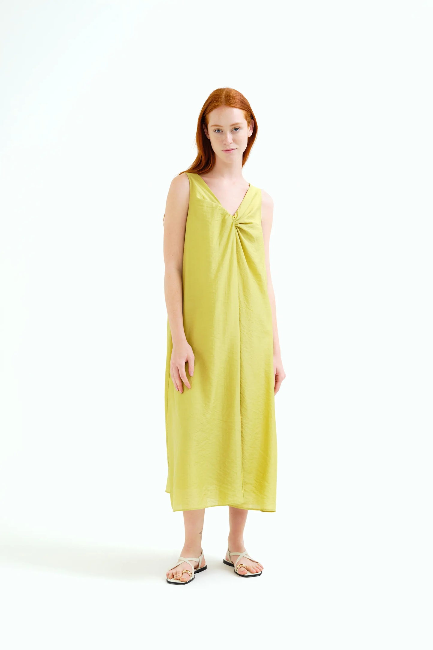 Long green dress with knotted detail