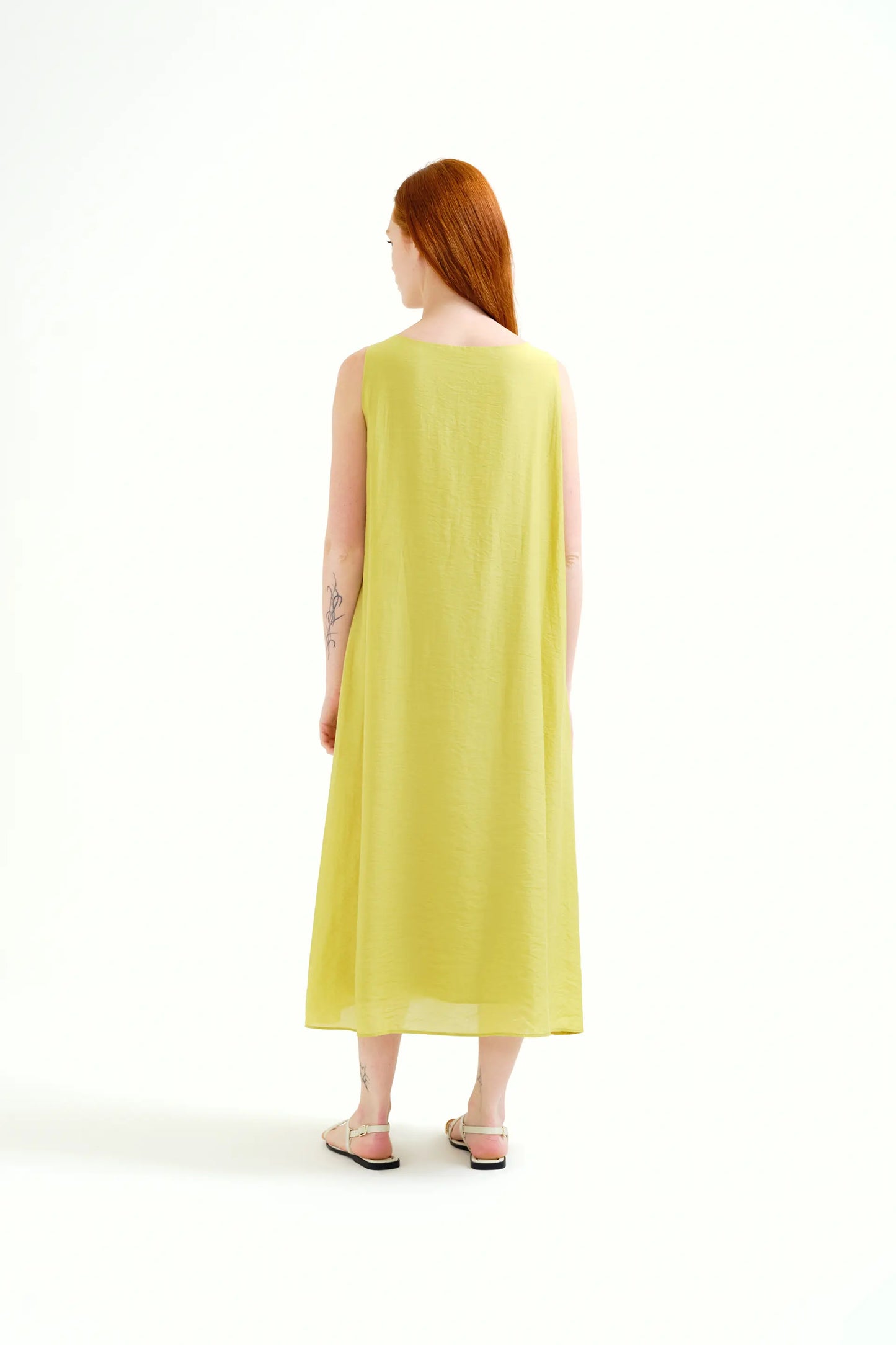 Long green dress with knotted detail
