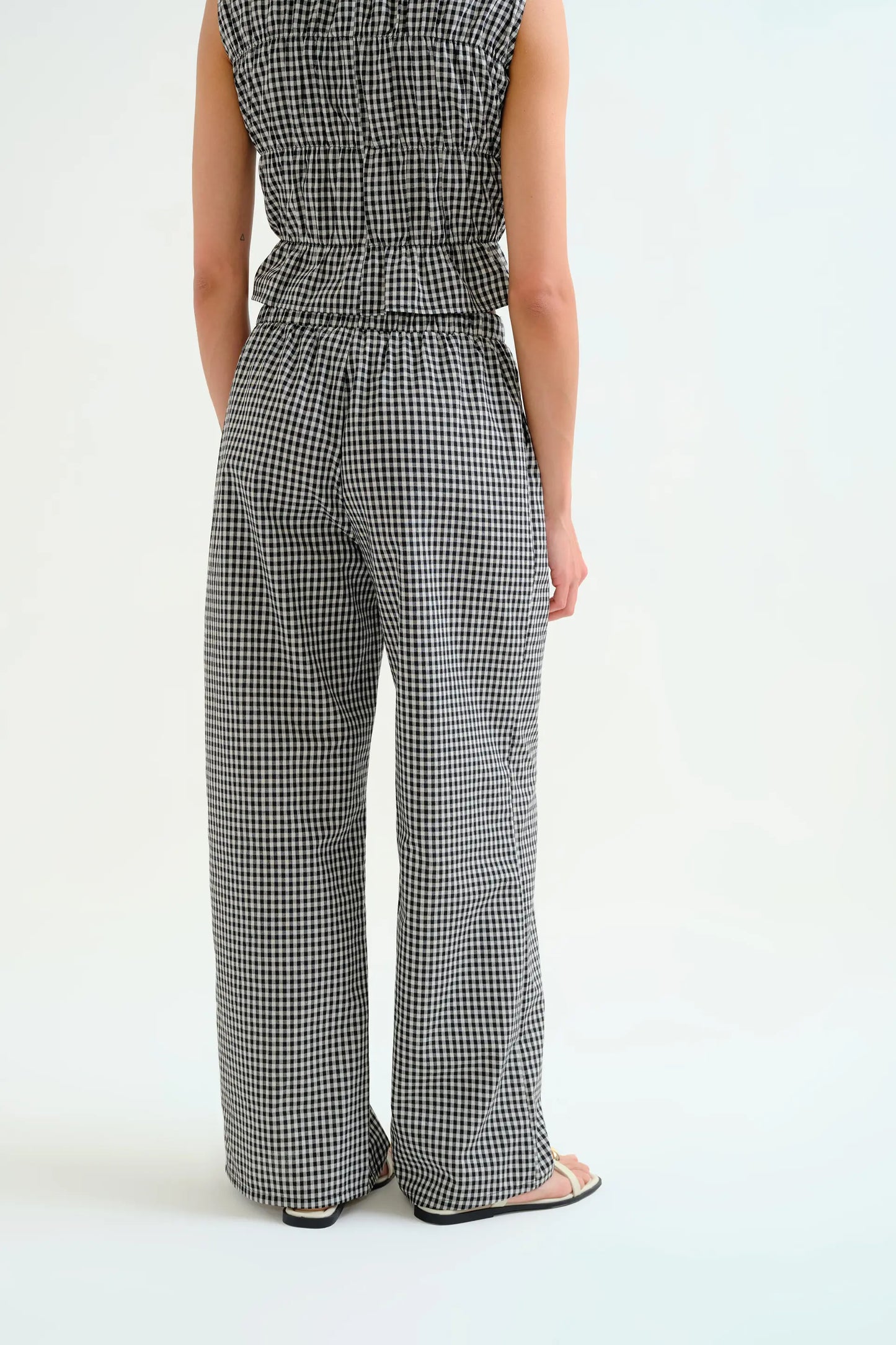 Pantaloni a quadri neri
