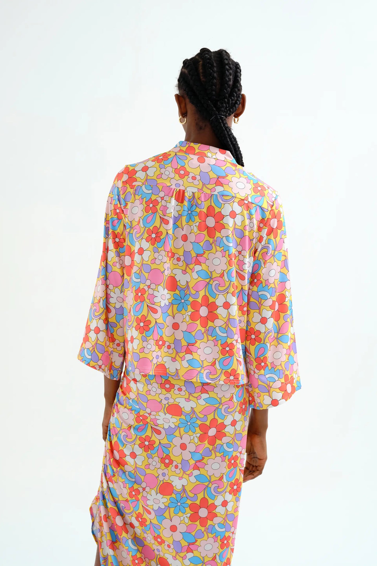 Top playero con estampado Bloom