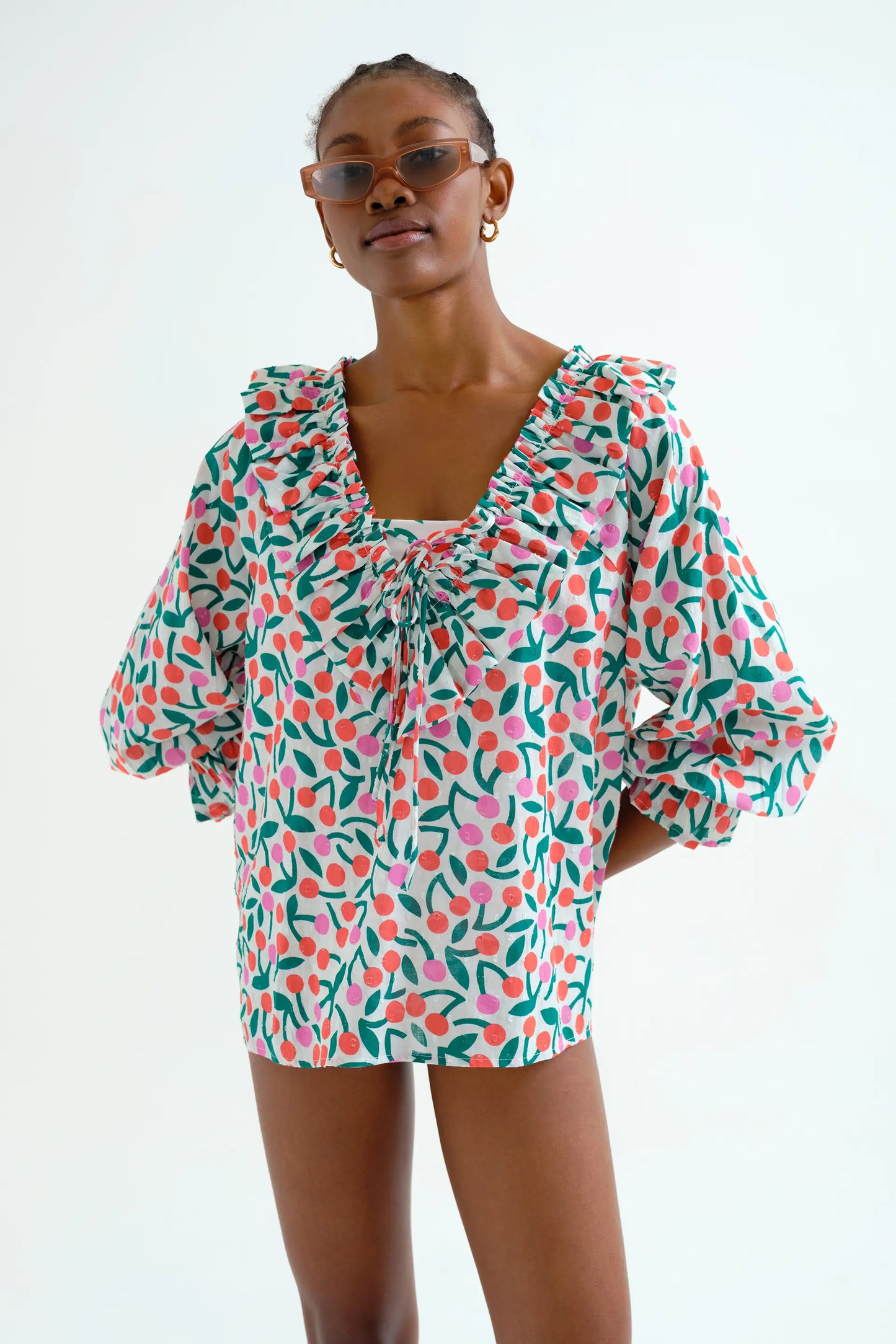 Long-sleeved beach top with burgundy print