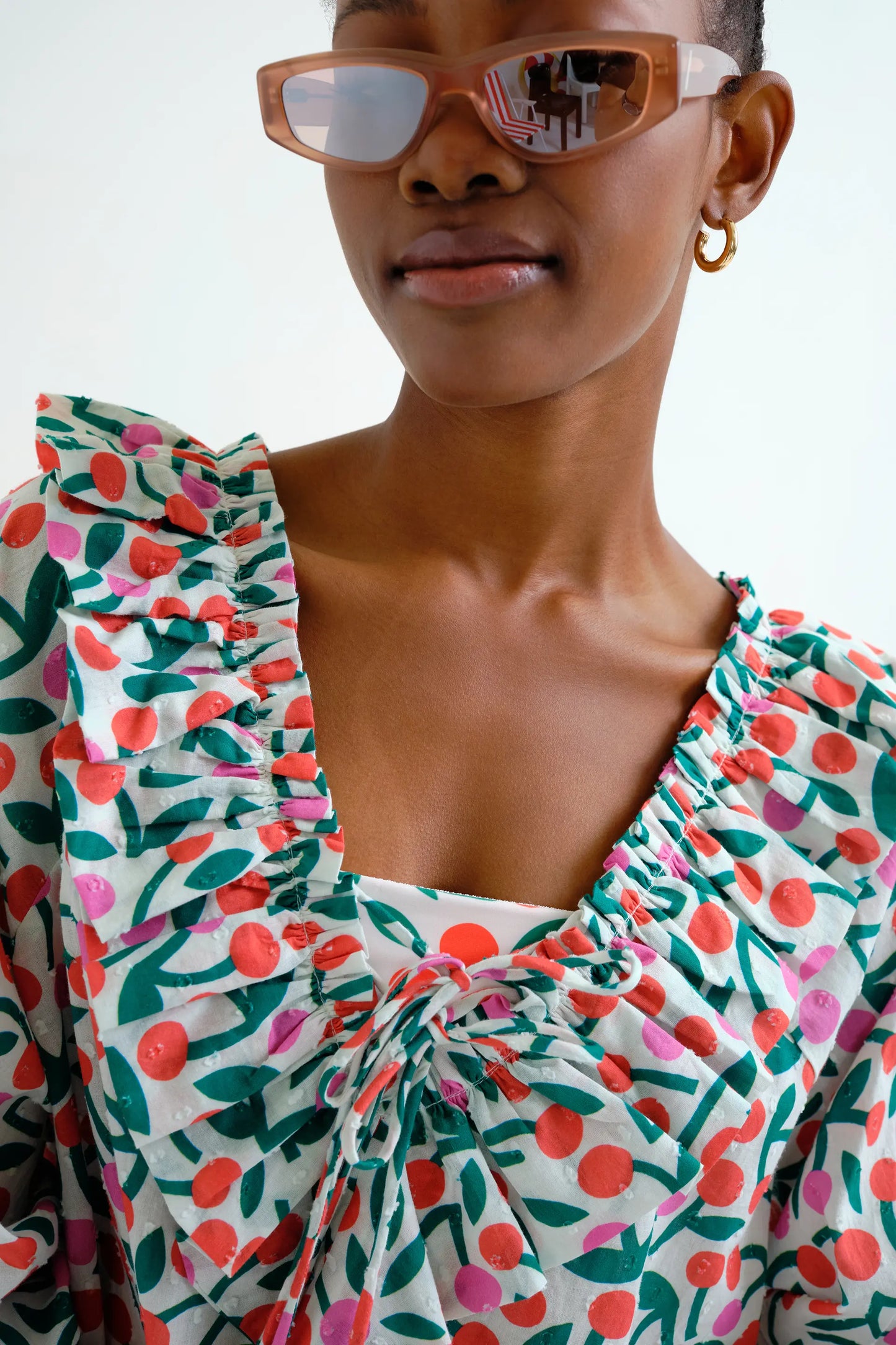 Long-sleeved beach top with burgundy print