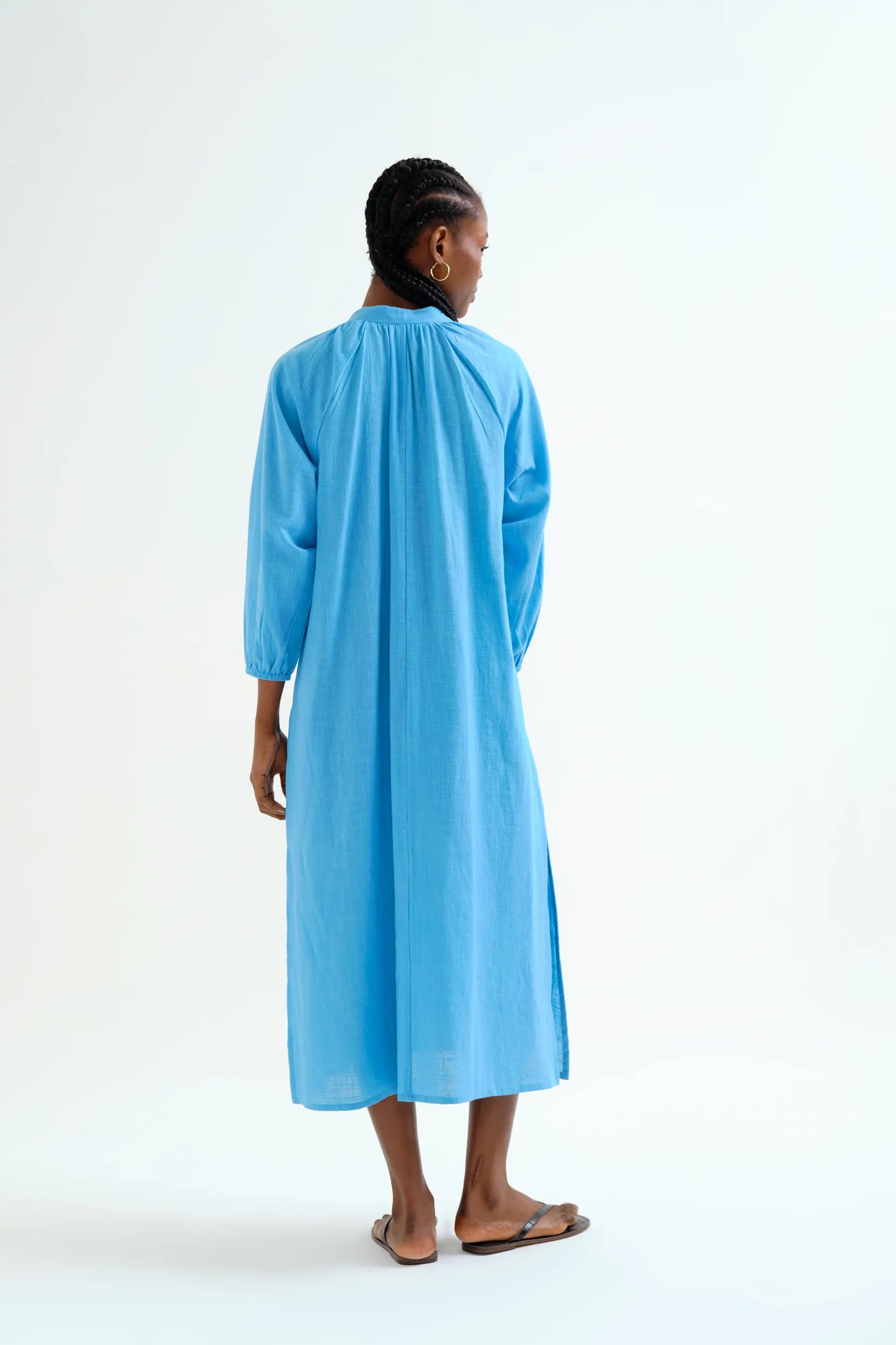 Long blue kaftan with buttons