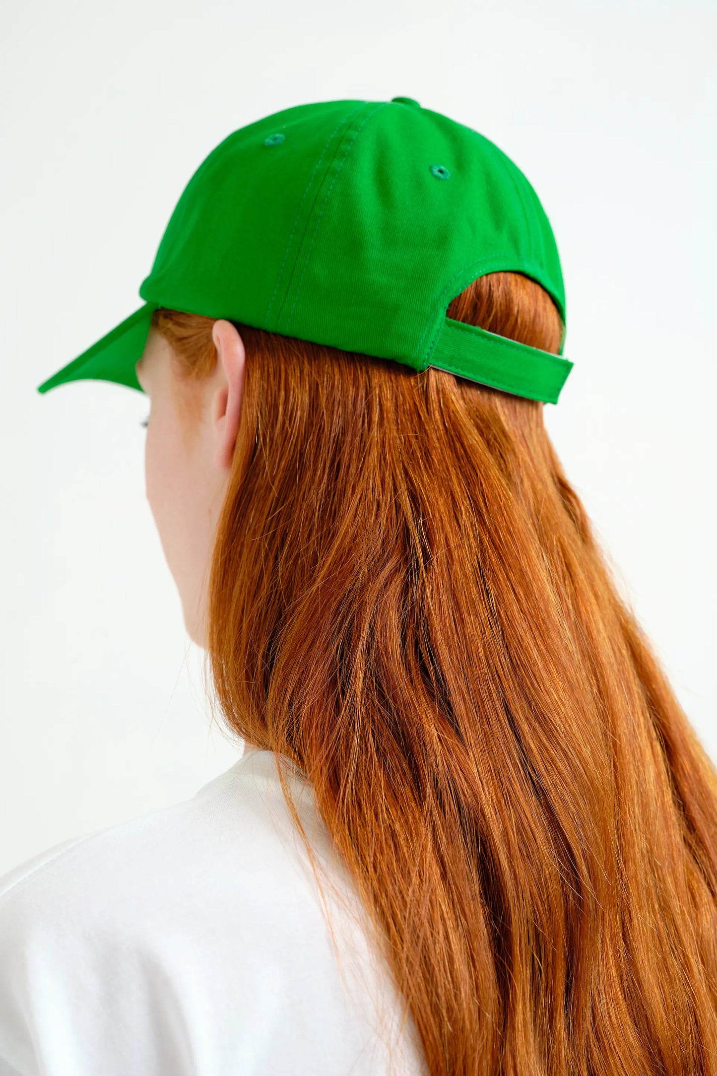 Green cap with palm tree embroidery
