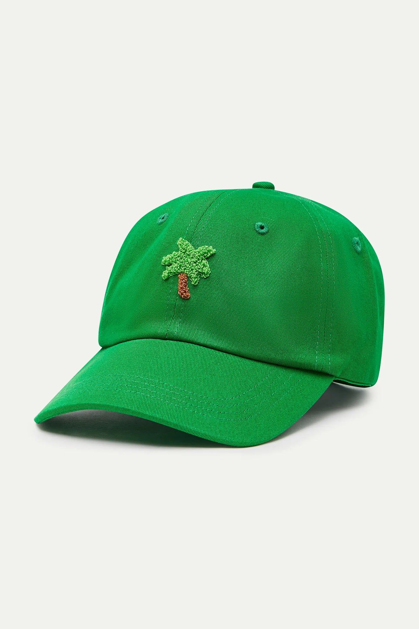Green cap with palm tree embroidery
