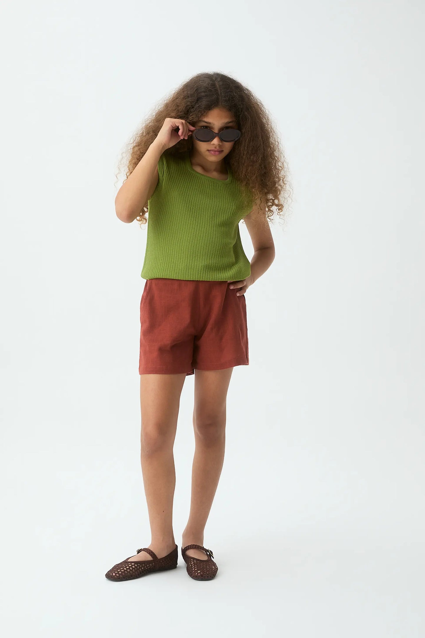 Top verde in maglia a maniche corte da bambina