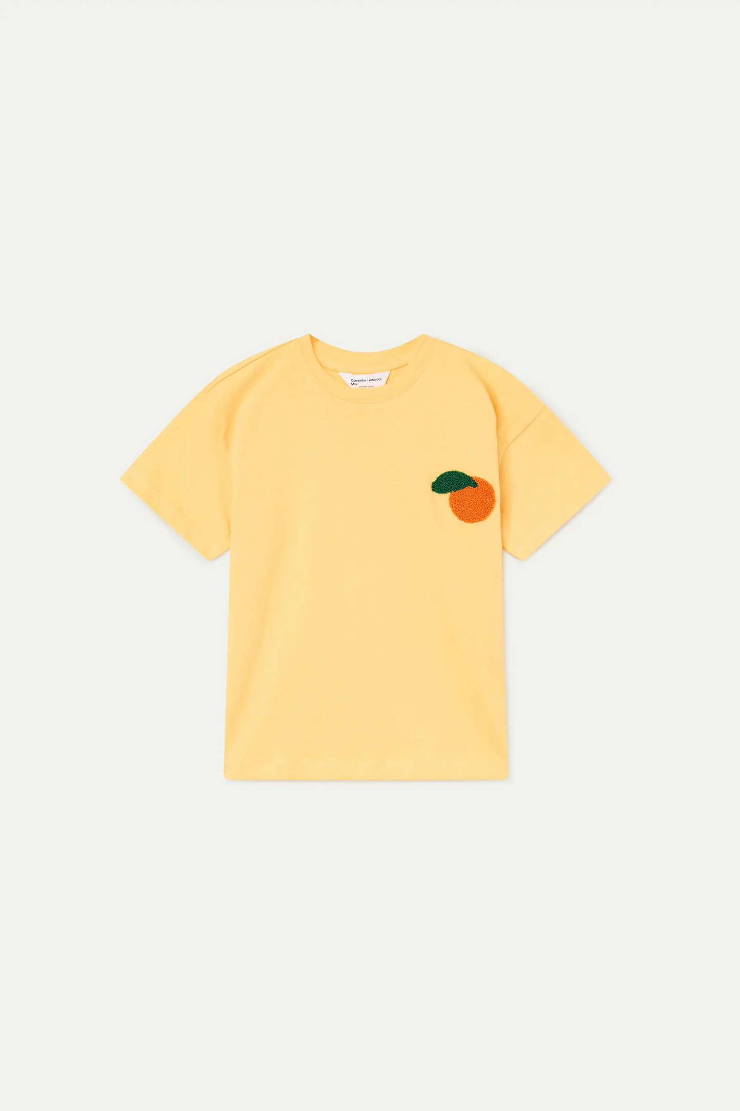 Camiseta de niña 100% algodón con parche de naranja