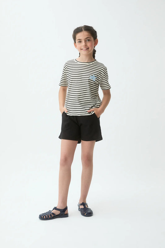 Camiseta de niña 100% algodón con parche de flor azul