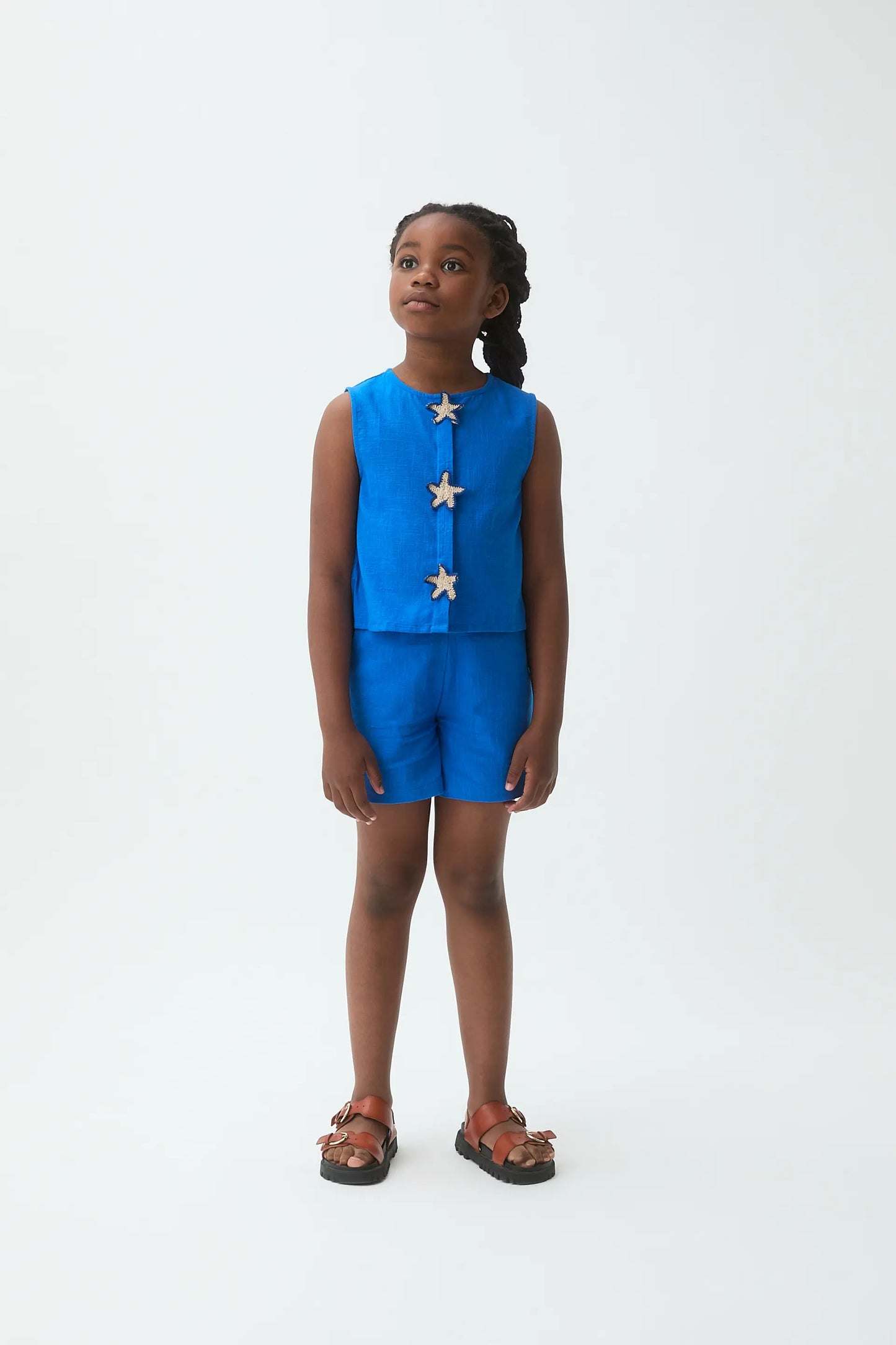 Top blu da bambina in cotone 100% con toppa a stella