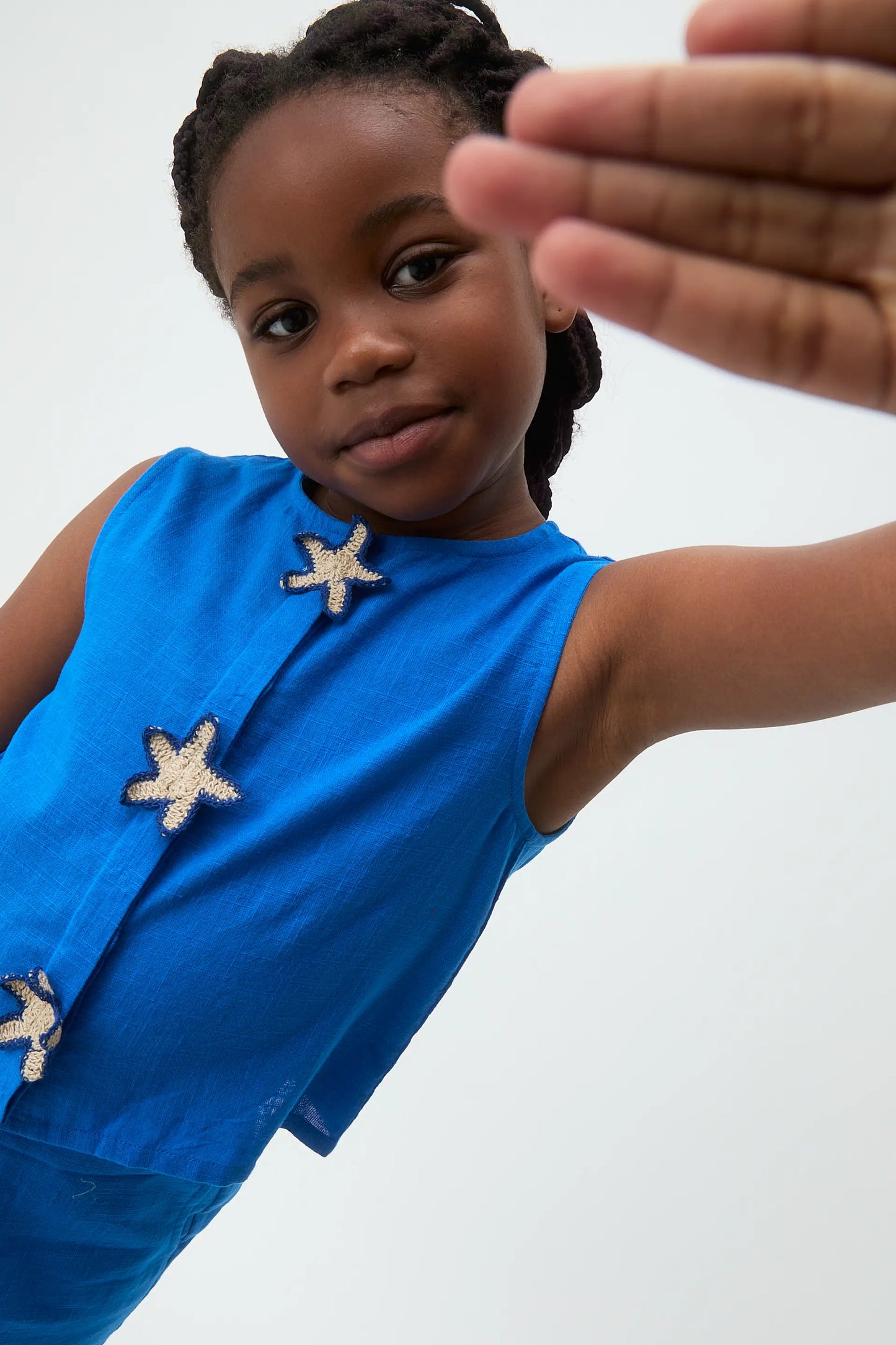 Top blu da bambina in cotone 100% con toppa a stella
