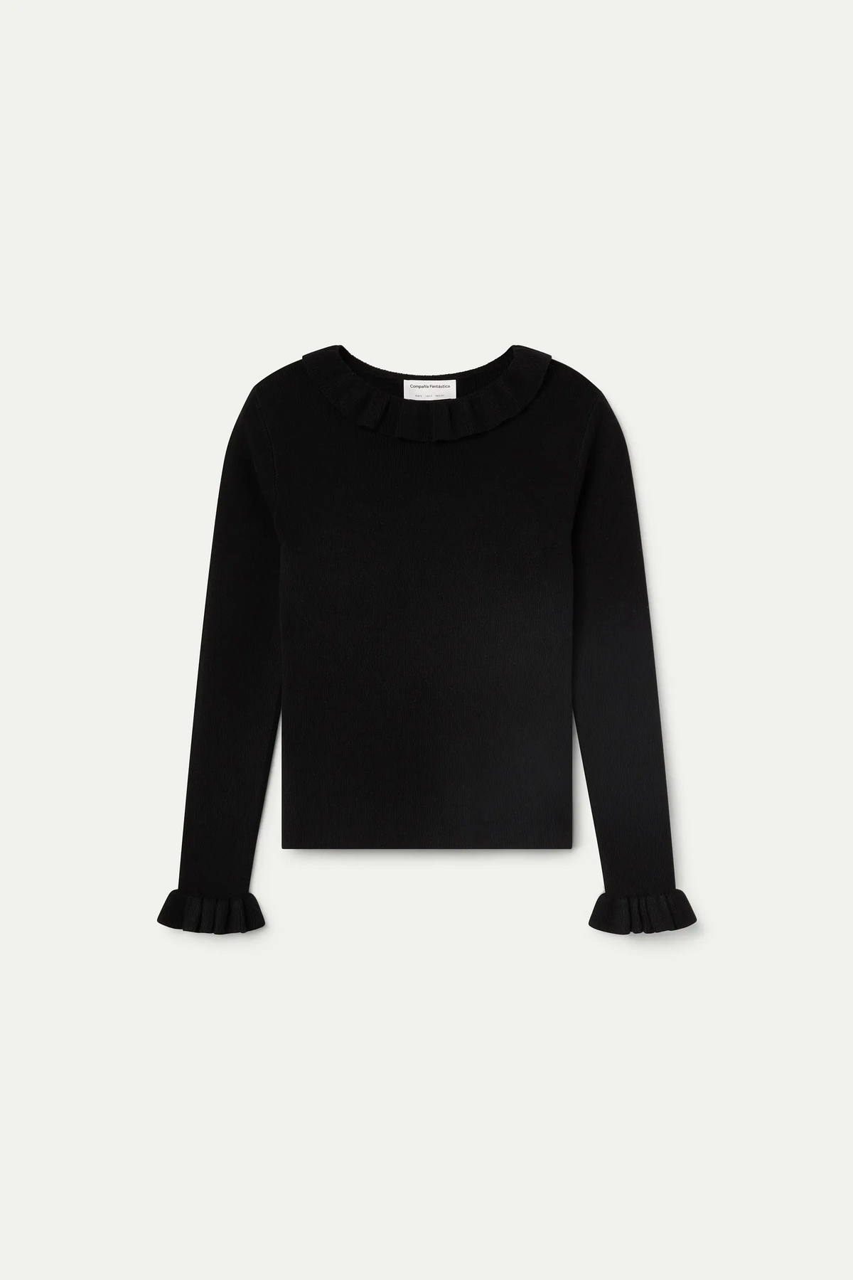 Top con volantes de punto negro