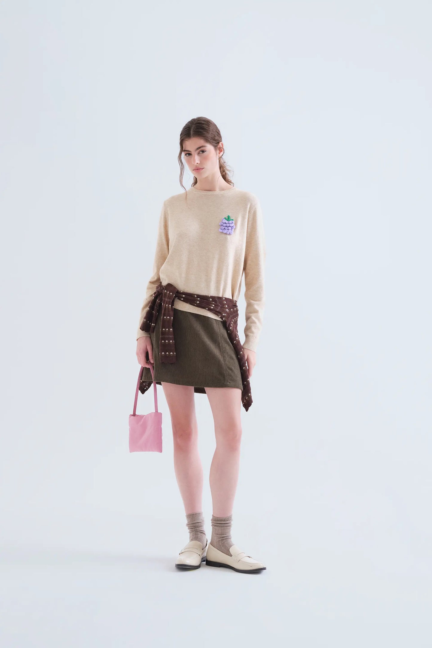Jersey punto beige con detalle de uva
