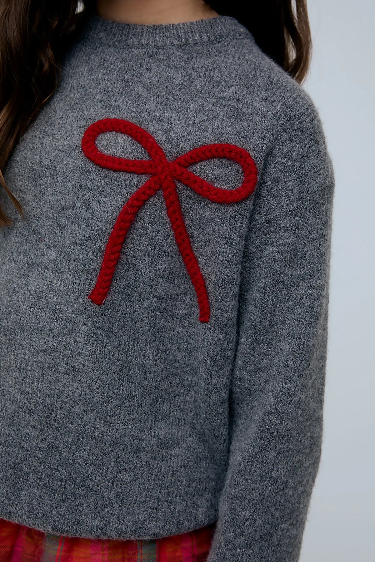 Jersey de niña gris oscuro con detalle de lazo rojo