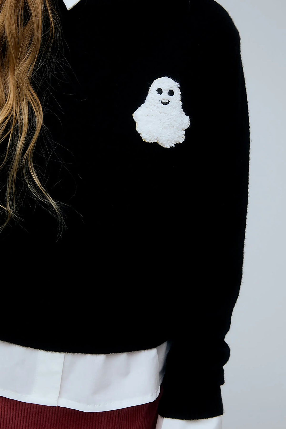 Jersey unisex negro con detalle de fantasma