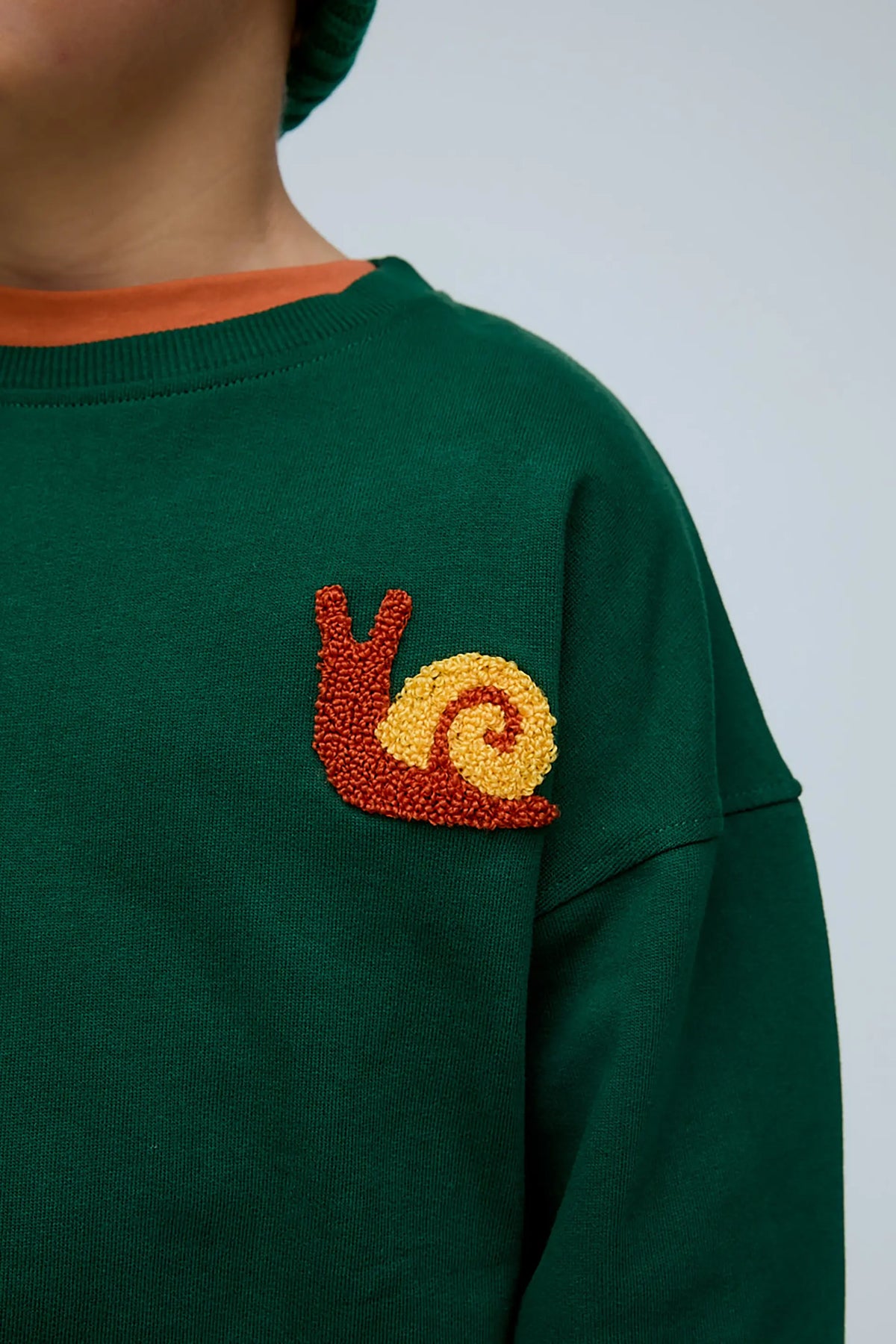 Sudadera unisex 100% algodón con bordado de Caracol