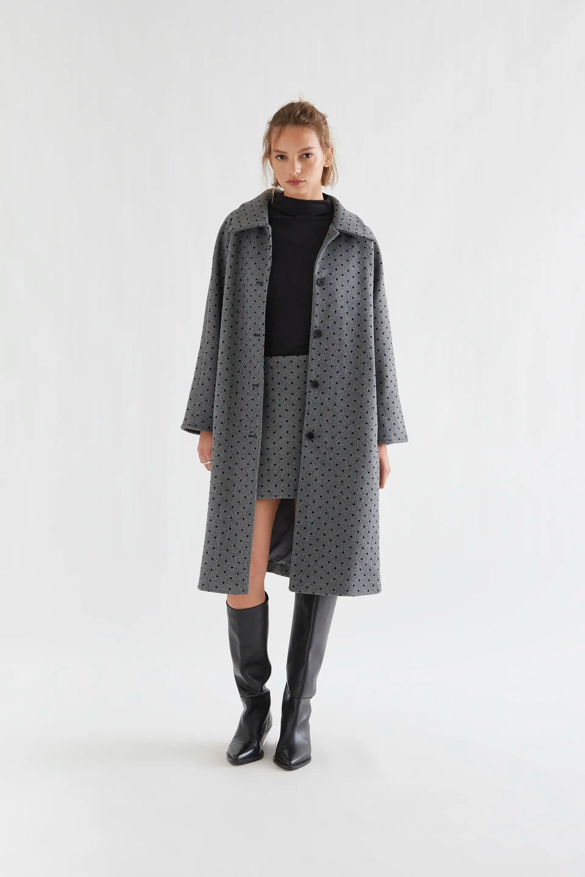 Gray coat with black knit