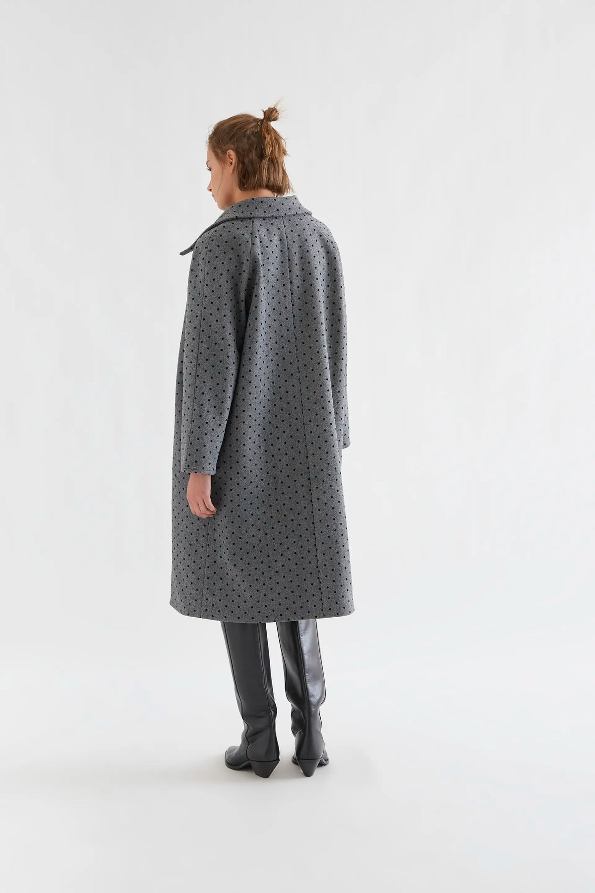 Gray coat with black knit