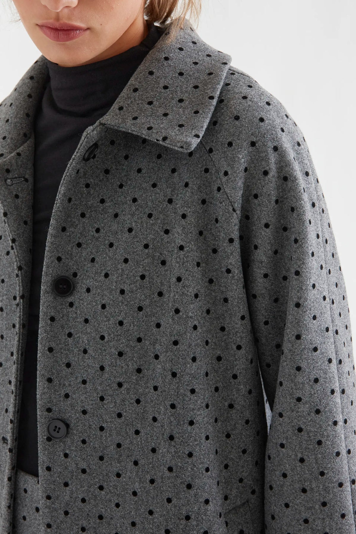 Gray coat with black knit