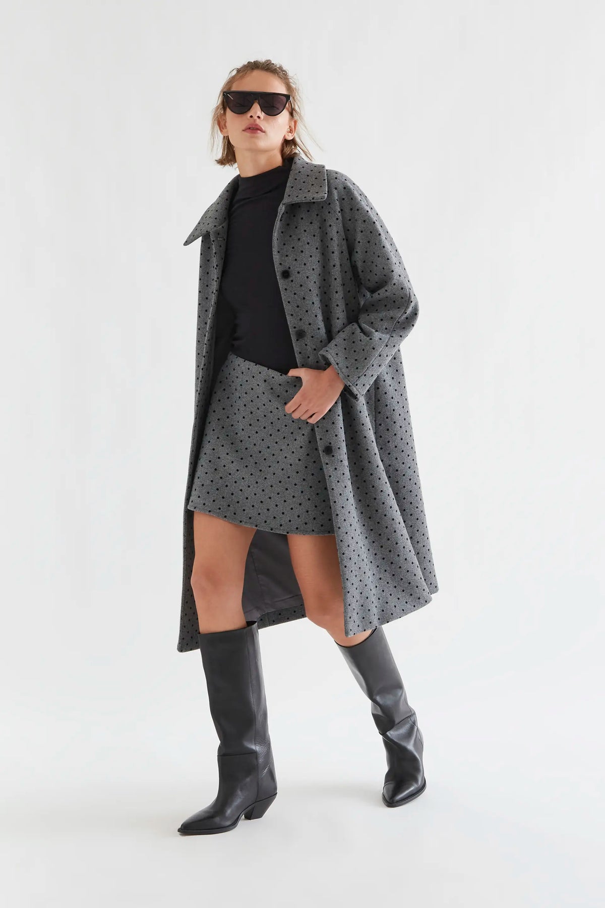 Gray coat with black knit