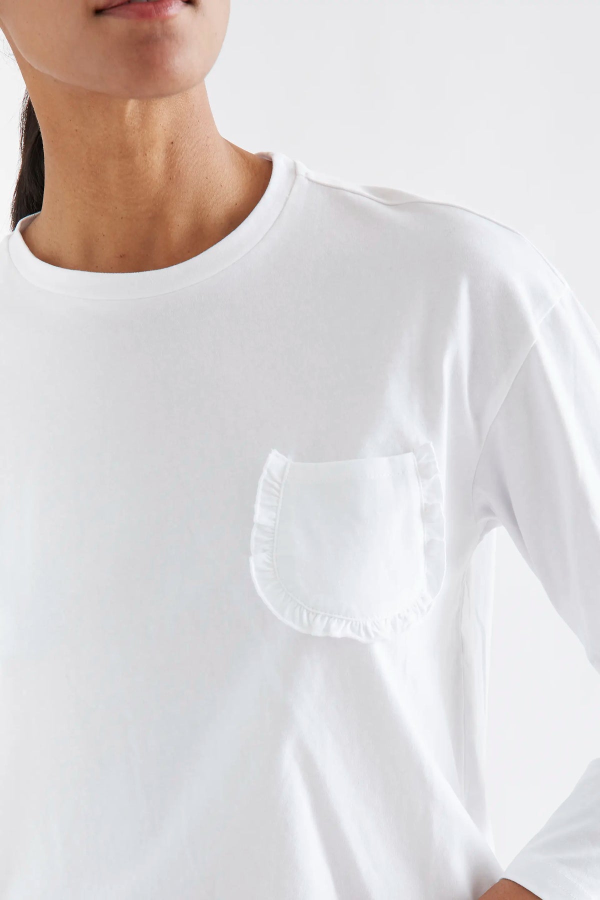 Camiseta 100% algodón blanco con bolsillo