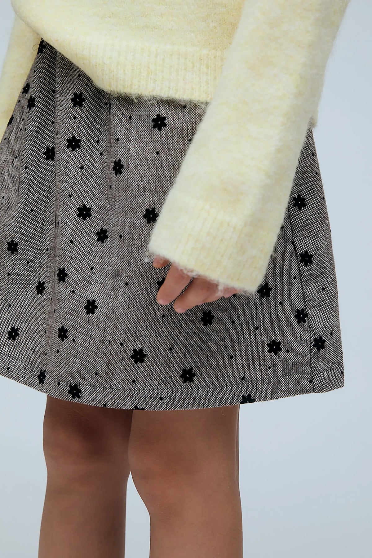 Falda corta tweed de niña con estampado de flores